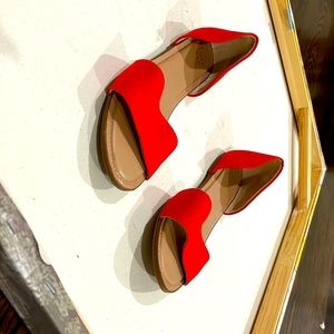Cute women’s orange open toe flats.